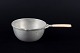 L'Art presents: 
Just 
Andersen, 
Denmark
Casserole in 
pewter with 
bamboo handle.
