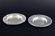 L'Art presents: 
Just 
Andersen, 
Denmark.
Two pewter 
dishes, one 
with fluted 
rim, the other 
with simple 
profiling.