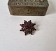 Karstens Antik 
presents: 
Old 
star-shaped 
garnet brooch