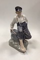 Danam Antik 
presents: 
Royal 
Copenhagen 
Figurine Boy on 
Rock No. 1659