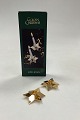 Danam Antik 
presents: 
Georg 
Jensen Golden 
Christmas Star 
Candlesticks