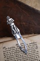 K&Co. presents: 
Old 
bookmark in 
silver (stamped 
Chr. J. 830S) 
Length 8.7cm. 
with motif of a 
sailor playing 
the ...