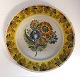 Lundin Antique 
presents: 
Kellinghusen.
 Earthenware 
dish. Diameter 
30.3 cm. With 
very small edge 
notches.