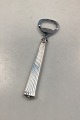 Danam Antik 
presents: 
Diplomat 
silver plated 
Bottle Opener 
