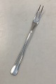 Danam Antik 
presents: 
Double-
fluted 
Cohr-ABSA 
silver-plated 
Cold Cut fork
