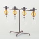 L'Art presents: 
Erik 
Höglund for 
Kosta Boda
Four-armed 
iron 
candelabrum 
with hanging 
glass prisms.