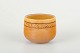 L'Art presents: 
Kähler, 
Denmark – Nils 
Kähler
Small bowl in 
uranium glaze 
with impressed 
zigzag 
decoration.