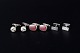 L'Art presents: 
Set of 
three pairs of 
cufflinks in 
silver.