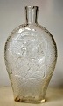 Pegasus – Kunst 
- Antik - 
Design 
presents: 
Swedish 
pocket lark in 
clear glass 
with Oscar II 
monogram and 
the ...