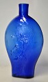 Pegasus – Kunst 
- Antik - 
Design 
presents: 
Swedish 
pocket lark in 
cobalt blue 
glass, 19th 
century.