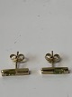 Antik Huset 
presents: 
Gold 
earrings in 8 
carat gold, 
inlaid bright 
green stone.