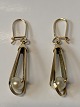Antik Huset 
presents: 
Earrings 
in 14 karat 
gold and pearl.
Length 4.1 cm.
