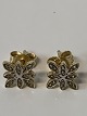 Antik Huset 
presents: 
14 carat 
gold earrings 
with diamonds.