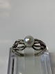 Antik Huset 
presents: 
Ladies' 
ring in 14 
carat white 
gold, with 
inlaid pearl,
Size. 54