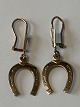 Antik Huset 
presents: 
Earrings 
in 8 carat gold 
with horseshoe.
Length 3.4 cm.