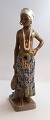 Lundin Antique 
presents: 
Dahl 
Jensen. 
Porcelain 
figurine. Girl 
from eastern 
Sierra Leone. 
Model # 1117. 
Height ...