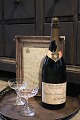 K&Co. presents: 
Decorative, 
old French 
advertising 
Bollinger 
champagne 
bottle with a 
really nice 
patina...