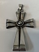 Antik Huset 
presents: 
Cross 
Pendant in 
Silver
Length with 
eyelet. 6.3 cm