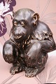 K&Co. presents: 
Bing & 
Grondahl 
stoneware 
figurine of a 
monkey in sung 
glaze, 
design by Jean 
Rene Gauguin...