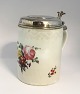 Lundin Antique 
presents: 
Royal 
Copenhagen. 
Lidded mug 
decorated with 
flowers with 
silver lid. Lid 
not stamped. 
...