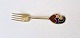 Karstens Antik 
presents: 
A.
Michelsen 
Christmas fork 
in gold-plated 
sterling silver 
with enamel 
1968