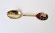 Karstens Antik 
presents: 
A.
Michelsen 
Christmas spoon 
in gold-plated 
sterling silver 
with enamel 
1968