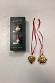 Danam Antik 
presents: 
Georg 
Jensen Golden 
Christmas 
Holiday 
Ornament - 
Christmas Pig 
and Heart 2003