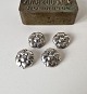 Karstens Antik 
presents: 
Evald 
Nielsen set of 
four silver 
buttons in the 
art nouveau 
style