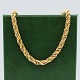 Antik 
Damgaard-
Lauritsen 
presents: 
Necklace 
of 14k gold and 
white gold, l. 
80 cm