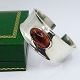 Antik 
Damgaard-
Lauritsen 
presents: 
N. E. 
From; Bangle of 
sterling silver 
with amber