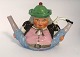 Lundin Antique 
presents: 
Royal 
Copenhagen. 
Teapot in the 
shape of a man. 
Hat is the lid, 
and legs are 
the spout ...