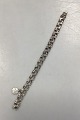 Danam Antik 
presents: 
Bismarck 
bracelet in 
silver with 
Four-leaf 
clover pendant