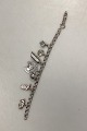 Danam Antik 
presents: 
Danish 
Bismarck 
bracelet in 
sterling silver 
with various 
pendants