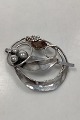 Danam Antik 
presents: 
Ornamented 
Jacob Hull Hair 
Jewelry in 
Silver Plated 
Metal with 
Stone