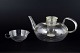 L'Art presents: 
Wilhelm 
Wagenfeld for 
Jenaer Glas
Teapot with 
strainer and 
creamer, 1930s.