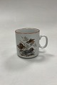 Danam Antik 
presents: 
Mads Stage 
Annuel Mug - 
Teal 1982