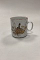 Danam Antik 
presents: 
Mads Stage 
Annuel Mug - 
Hare 1998