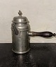 Reutemann Antik 
presents: 
Coffee pot 
made of Pewter 
With Wooden 
handle 1864