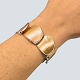 Antik 
Damgaard-
Lauritsen 
presents: 
Ole 
Lynggaard; 
Bracelet in 14k 
gold and white 
gold, set with 
four diamonds