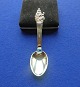 Antikkram 
presents: 
The 
Princess and 
the Pea 
children's 
cutlery in 
Danish 
gold-plated 
solid silver. 
Child's spoon
