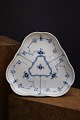 K&Co. presents: 
3-cornered 
cake plate / 
salad plate in 
Fluted Blue 
Plain from 
Royal 
Copenhagen.
1/27...