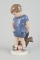 L'Art presents: 
Royal 
Copenhagen
Figurine “Boy 
with Teddy 
Bear”, model 
3468, 1920s.