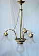 Pegasus – Kunst 
- Antik - 
Design 
presents: 
Danish Art 
Nouveau lamp in 
brass with four 
domes, circa 
1910.