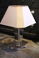 K&Co. presents: 
A pair of 
French 
Hollywood 
Regency acrylic 
glass table 
lamps 
from the 
1970s. with 
brass edges...