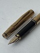 Reutemann Antik 
presents: 
Gold-
double Cross 
fountain pen 
with 14K gold 
nib
