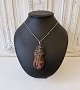 Karstens Antik presents: Silver necklace with large amber pendant wrapped with silver thread
