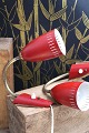 K&Co. presents: A pair of old retro wall lamps in red painted metal and brass from the 50s.