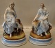 Klosterkælderen presents: 2 Antique European figurines 29 x 18.5 cm Woman with dog and Woman with kid goat
