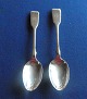 Antikkram presents: Pair of children's spoons in English sterling silver. L approx. 14cm & approx. 15cm.