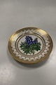 Danam Antik presents: Royal Copenhagen Antique Plate with Flower Motif and gold. Signed by Christian Klein from ...